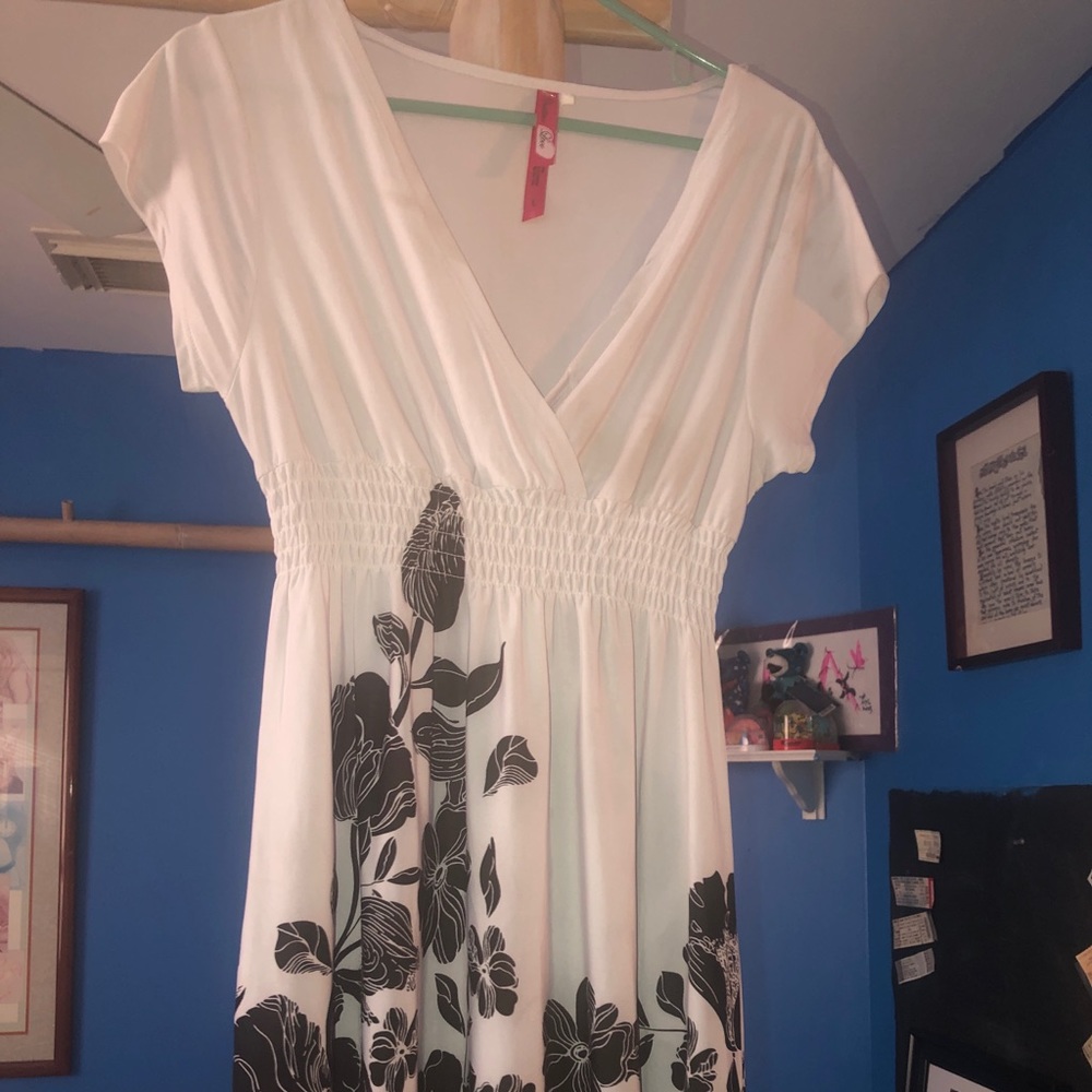 White elastic dress with black floral pattern